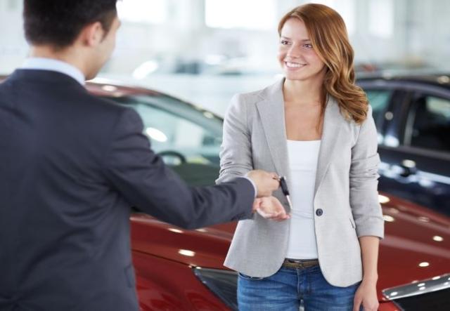 woman car dealership